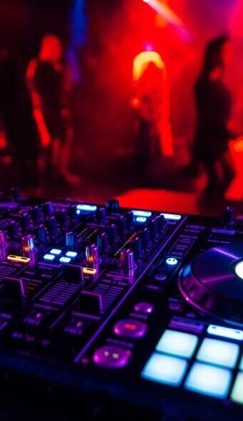 professional_dj_mixer_controller_mixing_music_nightclub